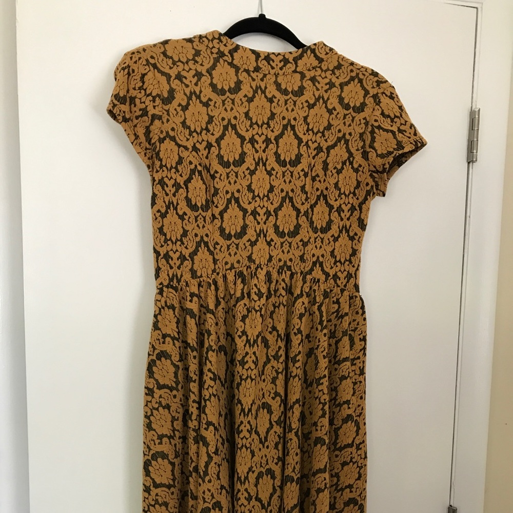 Mustard yellow dress.
